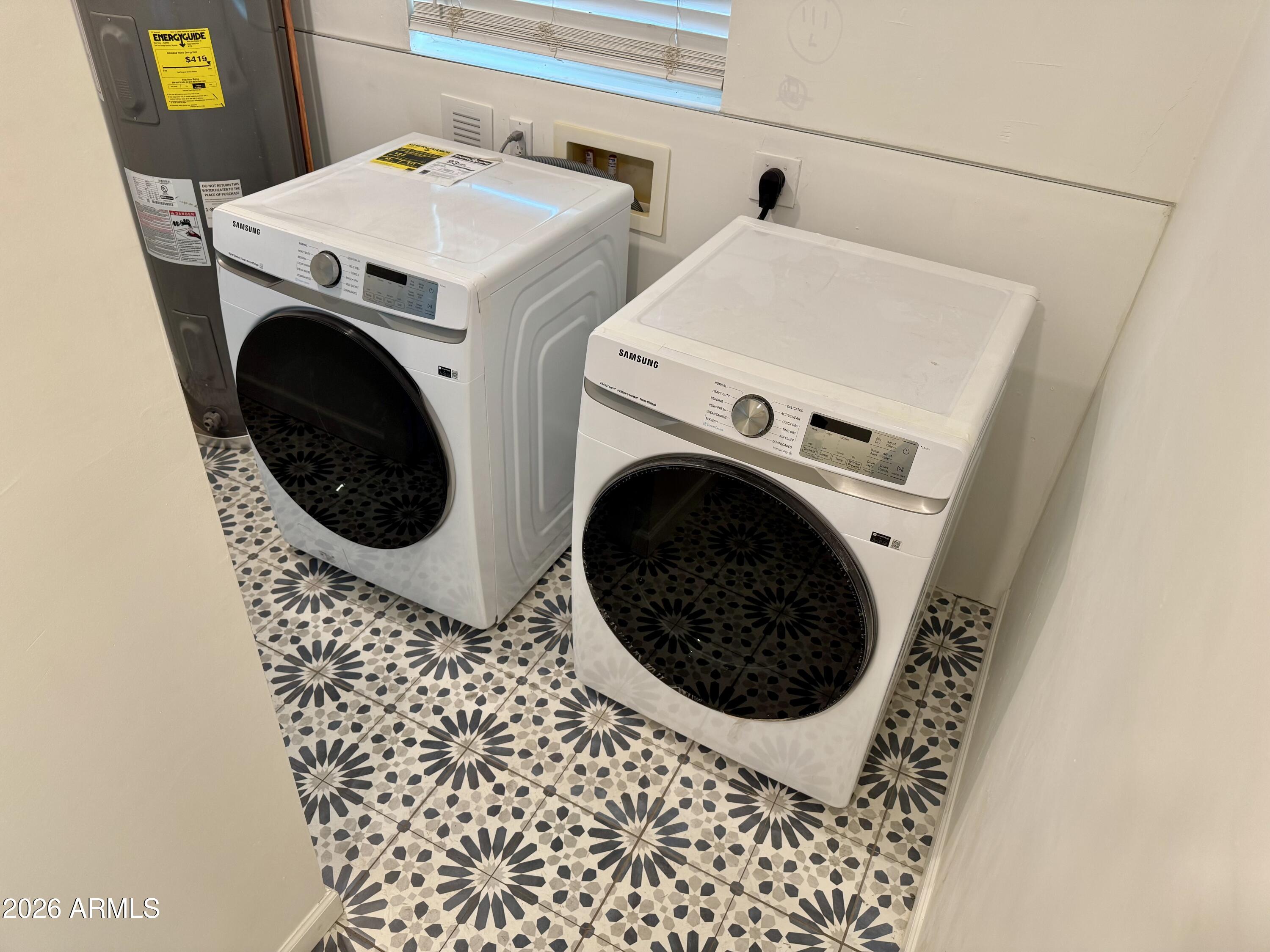 1409 North 5th Street Phoenix, AZ 85004 - Photo 9 of 9 a utility room with dryer and washer
