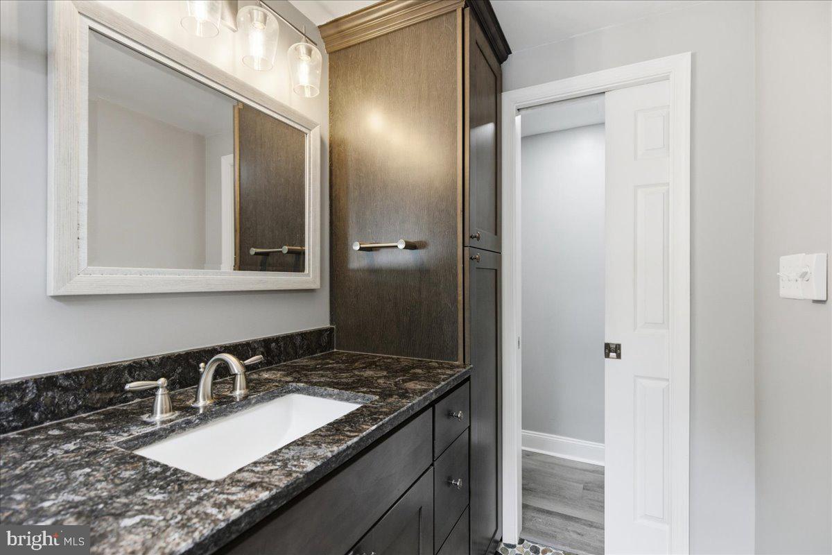 2175 Ponds Wood Road Huntingtown, MD 20639 - Photo 39 of 76 Primary bath #2 vanity and storage cabinetry