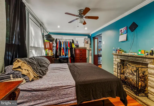 a bed room with a bed and a walk in closet