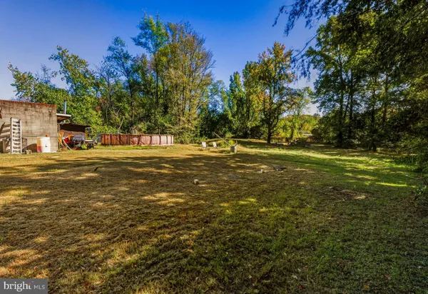 a view of street with parked cars