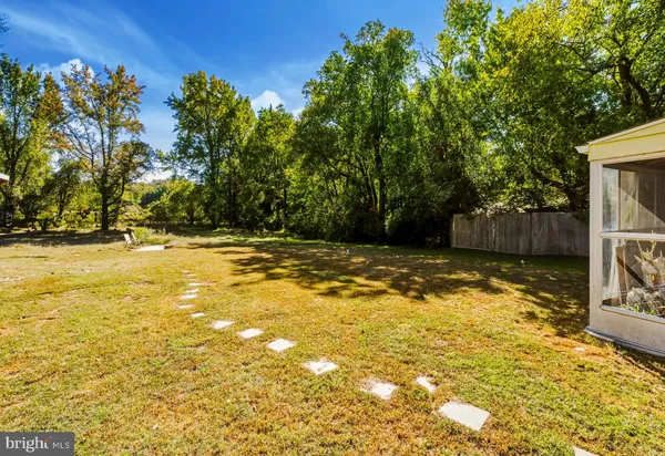 a view of a pool with an outdoor space