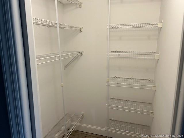 803 Southeast Central Parkway, Unit 5 Stuart, FL 34994 - Photo 12 of 19 a view of walk in closet