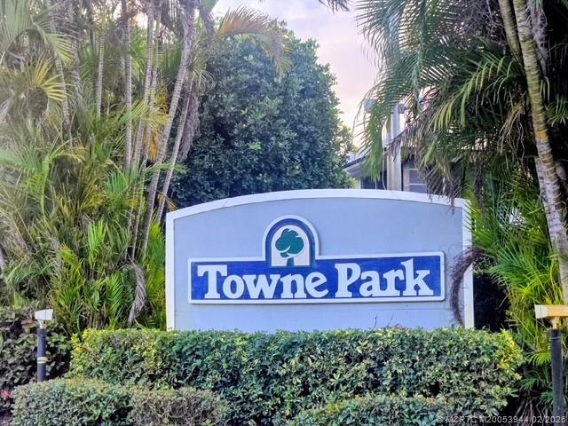 803 Southeast Central Parkway, Unit 5 Stuart, FL 34994 - Photo 15 of 19 a sign that is on a wooden wall