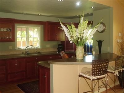 1118 Monroe Court Santa Rosa, CA 95404 - Photo 4 of 11 Built in 1950, this home has an upgraded kitchen designed and built with cement countertops, Thermidor stove, Fisher and Paykel dishwasher, Miele oven, Grohe faucet, Sub-Zero refrigerator and beautiful cabinates embellished with high end hardware.