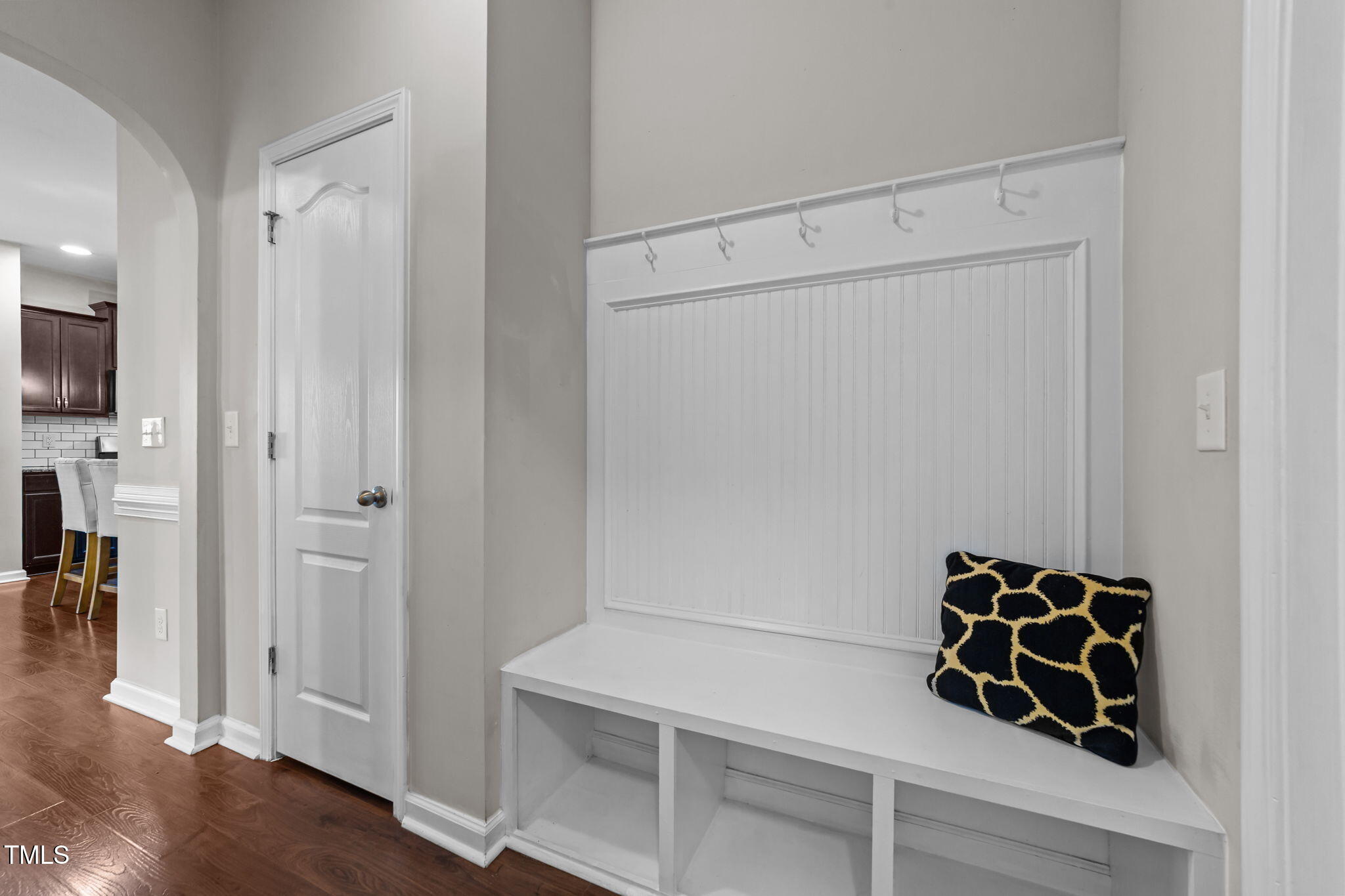 83 Mariners Point Way Garner, NC 27529 - Photo 13 of 49 a room with white wall and black white door