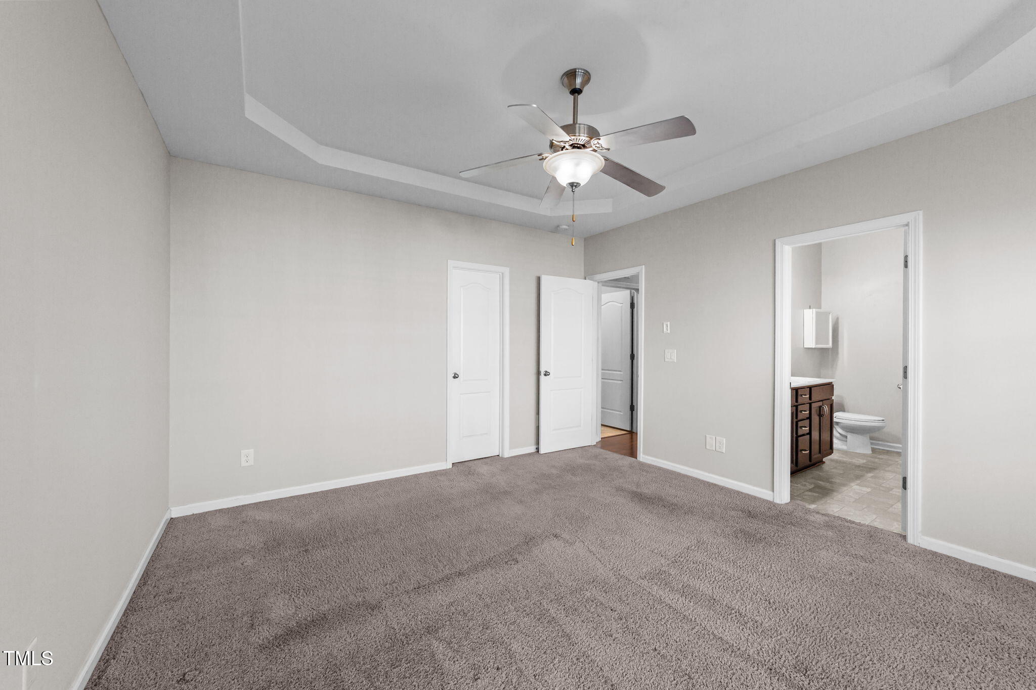83 Mariners Point Way Garner, NC 27529 - Photo 16 of 49 a view of a big room with chandelier fan and closet