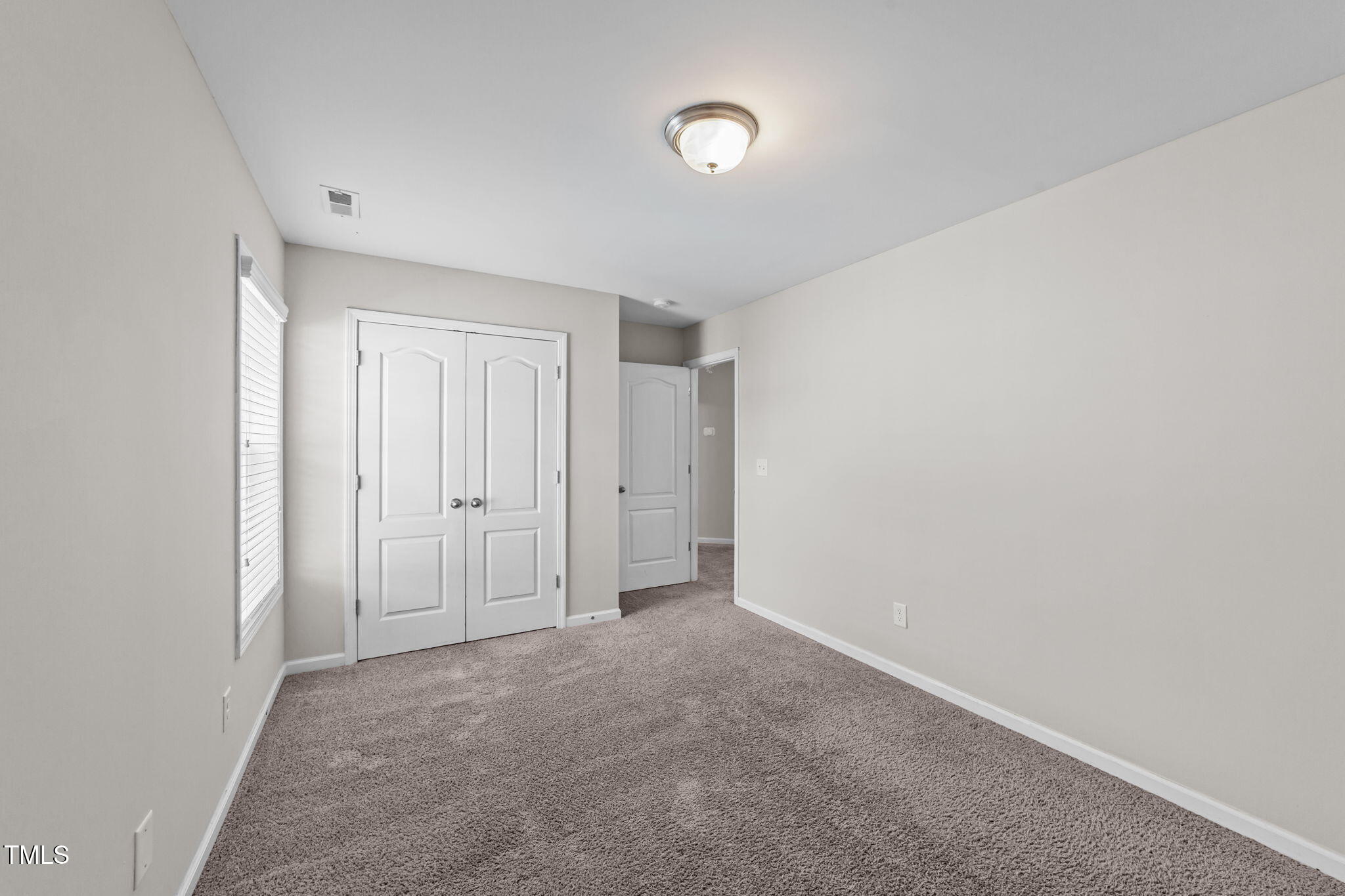 83 Mariners Point Way Garner, NC 27529 - Photo 20 of 49 a view of an empty room