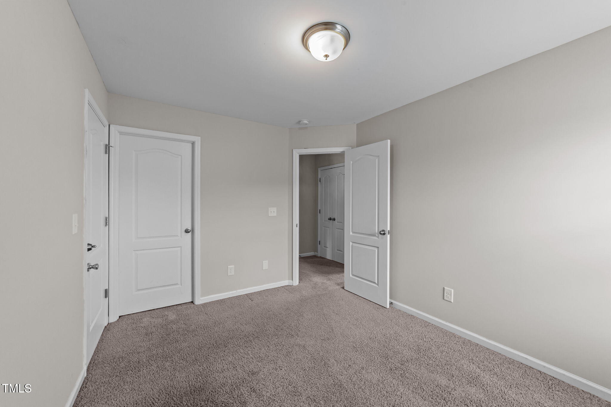83 Mariners Point Way Garner, NC 27529 - Photo 22 of 49 a view of an empty room and a window