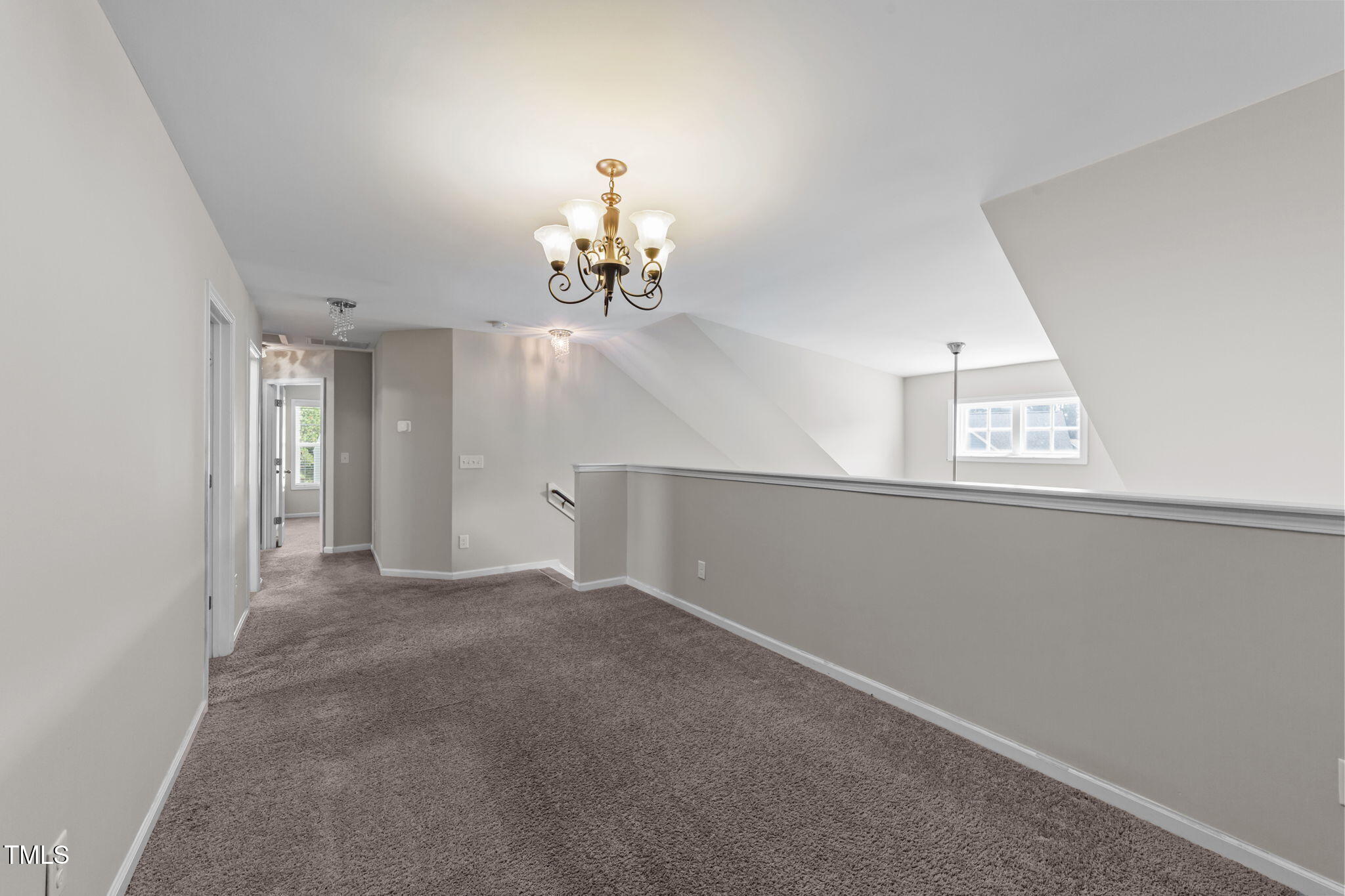 83 Mariners Point Way Garner, NC 27529 - Photo 28 of 49 a view of an empty room with a window