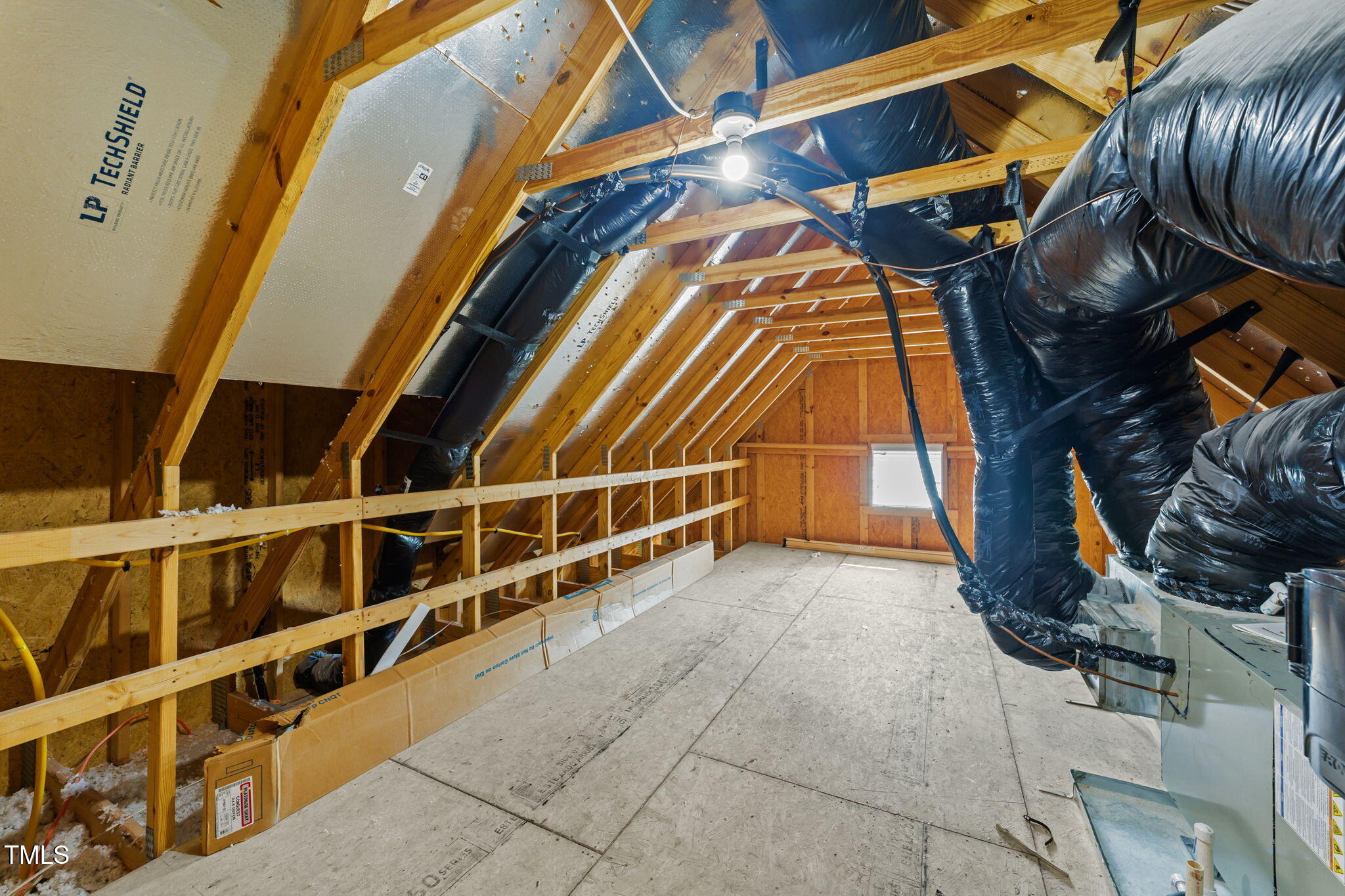 83 Mariners Point Way Garner, NC 27529 - Photo 30 of 49 a view of an empty room with wooden shelves