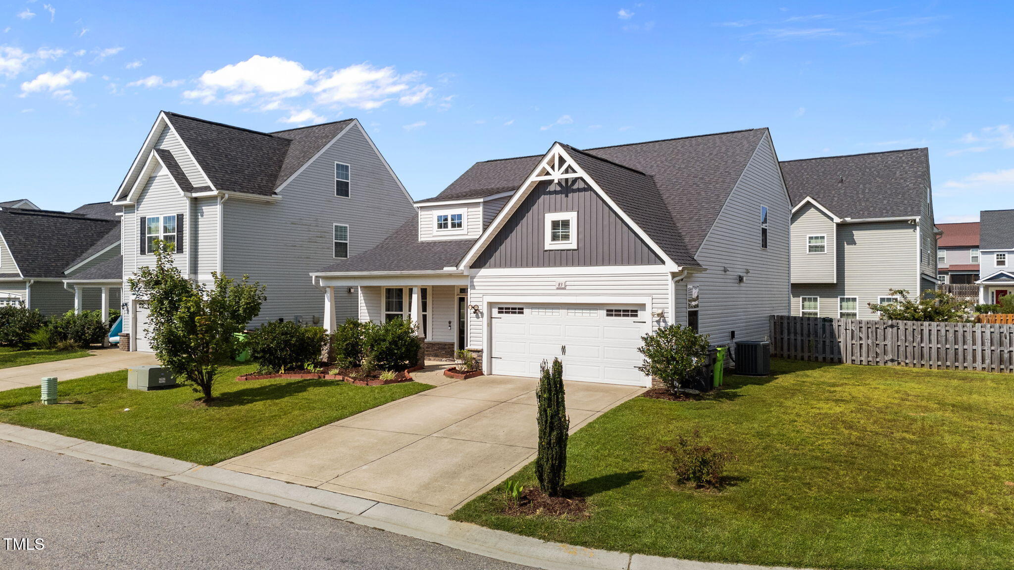 83 Mariners Point Way Garner, NC 27529 - Photo 32 of 49 a front view of a house with a yard