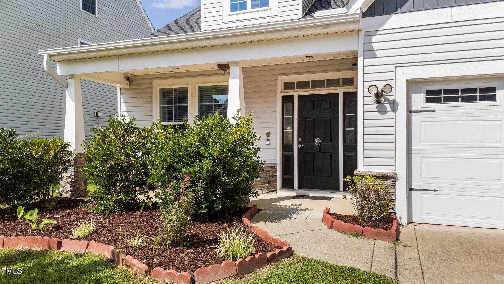 83 Mariners Point Way Garner, NC 27529 - Photo 37 of 49 a front view of a house with a yard