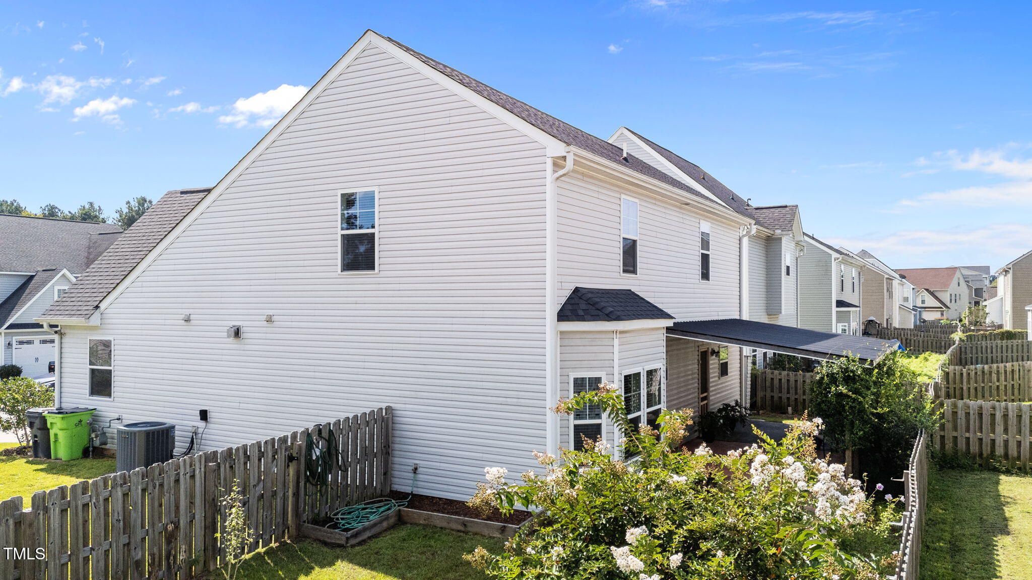 83 Mariners Point Way Garner, NC 27529 - Photo 38 of 49 a view of a house with yard and plants