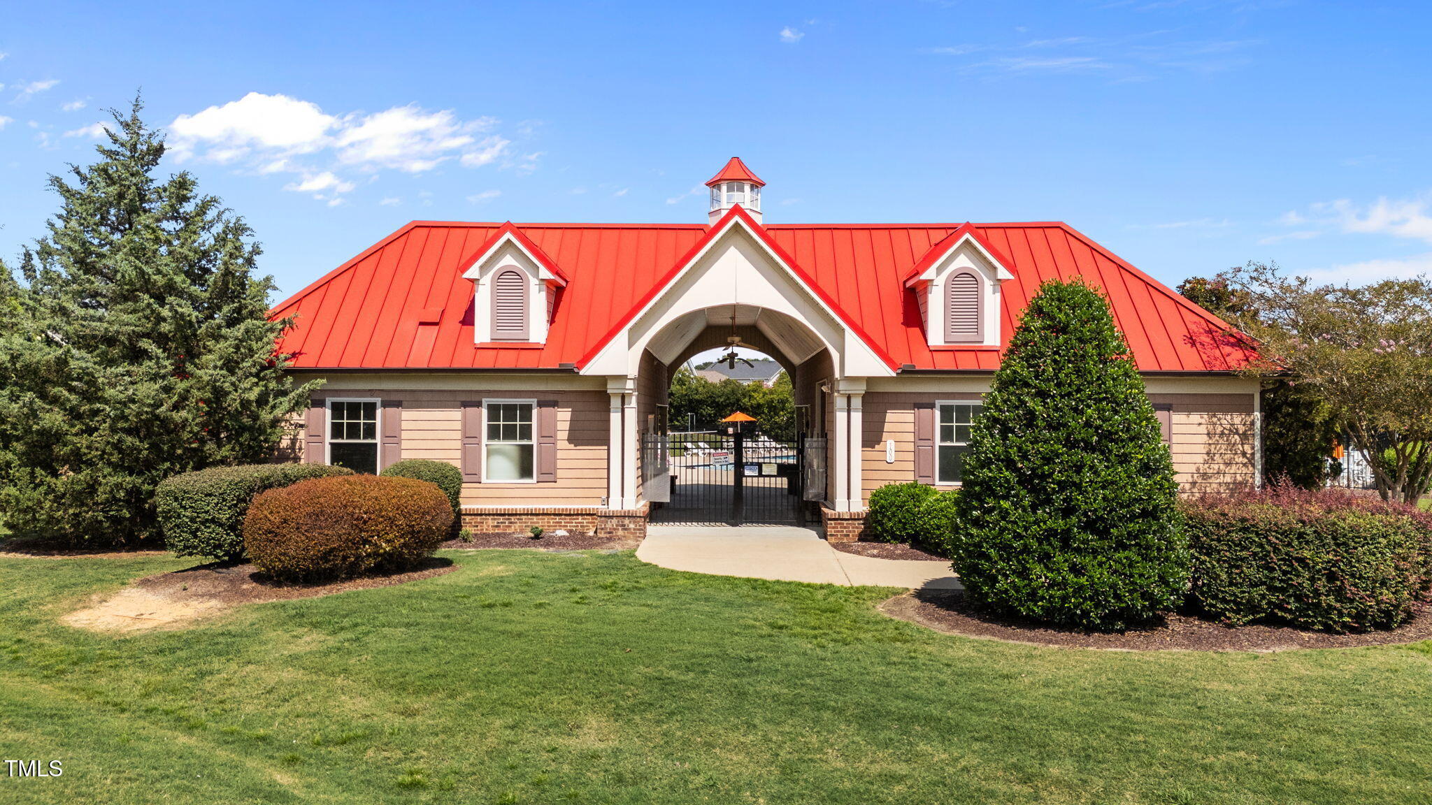 83 Mariners Point Way Garner, NC 27529 - Photo 44 of 49 a front view of house with swimming pool and porch
