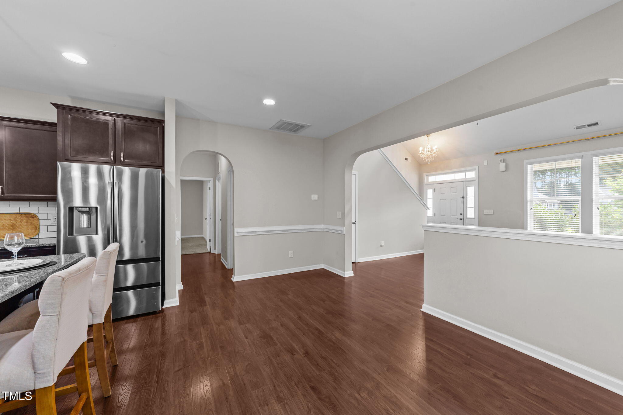 83 Mariners Point Way Garner, NC 27529 - Photo 10 of 49 a view of a kitchen with wooden floor and electronic appliances