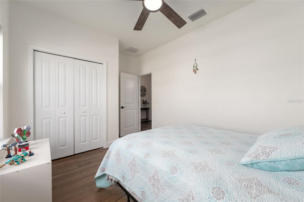 6659 Southwest 12th Lane Gainesville, FL 32607 - Photo 26 of 37 a bedroom with a bed and a window