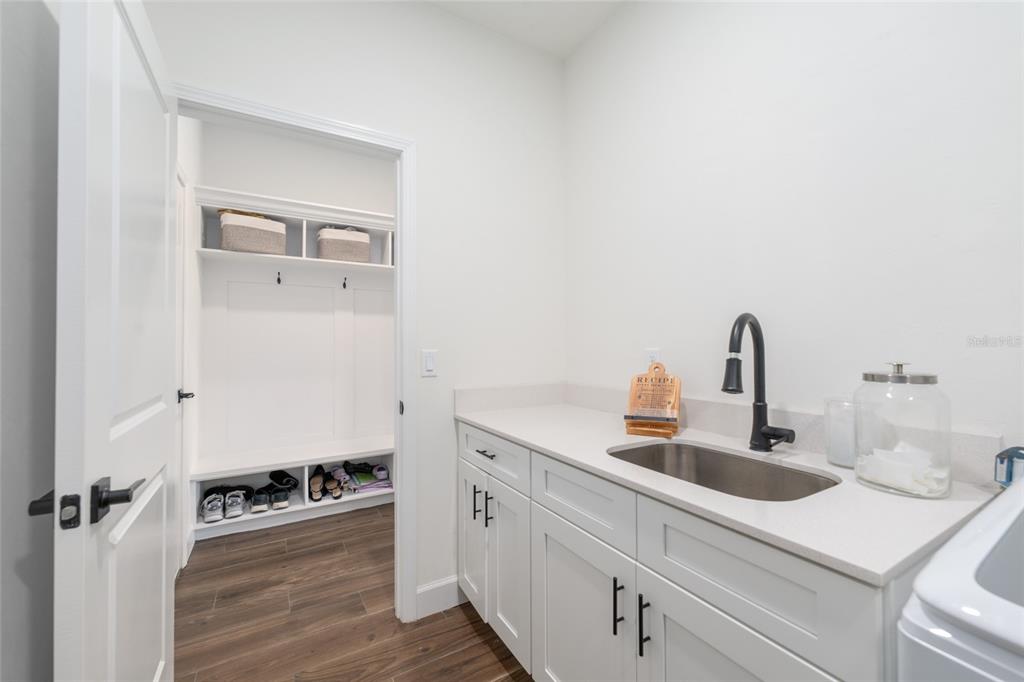 6659 Southwest 12th Lane Gainesville, FL 32607 - Photo 29 of 37 a bathroom with a sink and a mirror