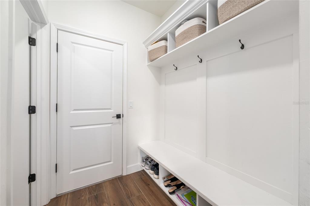 6659 Southwest 12th Lane Gainesville, FL 32607 - Photo 30 of 37 a view of an entryway with wooden floor