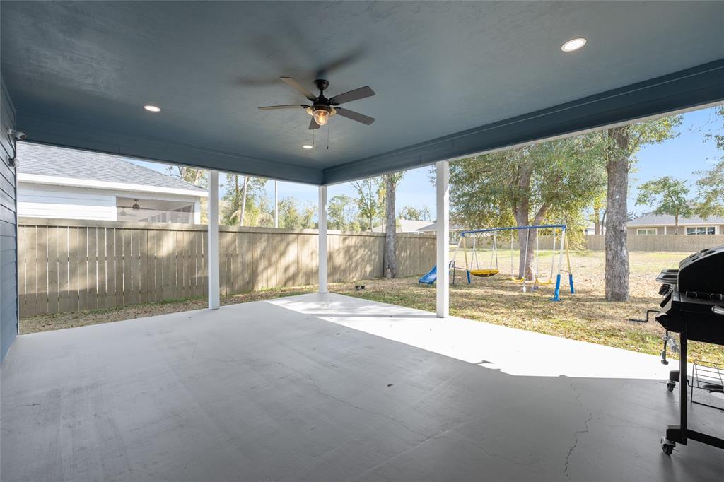 6659 Southwest 12th Lane Gainesville, FL 32607 - Photo 32 of 37 a view of empty room with wooden floor and fan