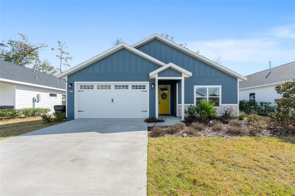 6659 Southwest 12th Lane Gainesville, FL 32607 - Photo 35 of 37 a view of house with garden