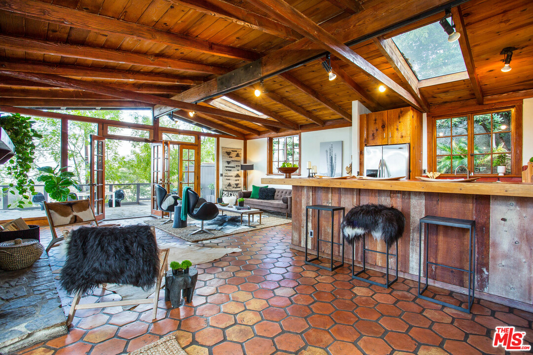 7280 Caverna Drive Los Angeles, CA 90068 - Photo 11 of 30 a outdoor space with lots of furniture and garden view