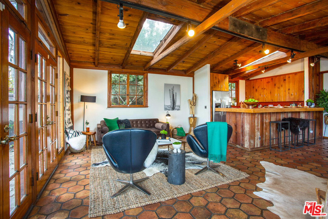 7280 Caverna Drive Los Angeles, CA 90068 - Photo 13 of 30 a living room with patio furniture