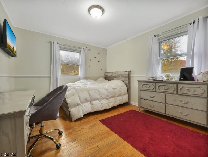 69 Intervale Road Boonton, NJ 07005 - Photo 15 of 29 a bedroom with a bed and a window
