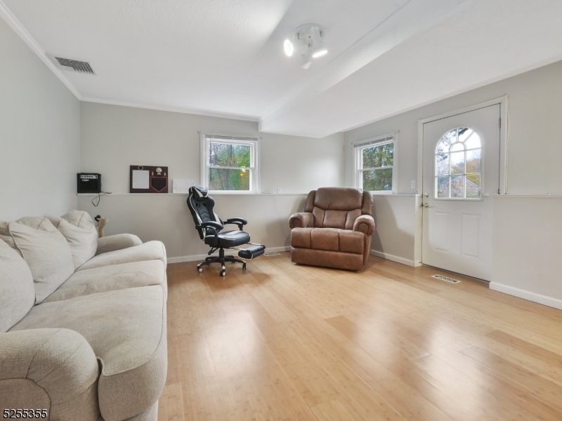 69 Intervale Road Boonton, NJ 07005 - Photo 19 of 29 a living room with furniture and a couch