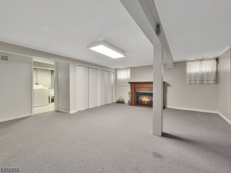 69 Intervale Road Boonton, NJ 07005 - Photo 22 of 29 a view of empty room with a fireplace