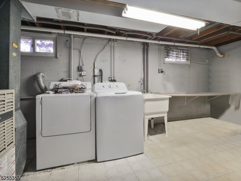69 Intervale Road Boonton, NJ 07005 - Photo 23 of 29 a utility room with dryer and washer