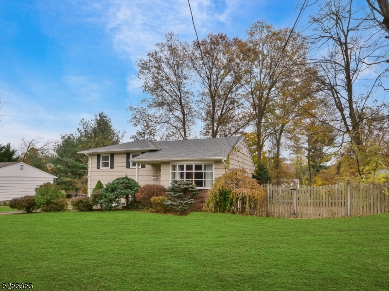 69 Intervale Road Boonton, NJ 07005 - Photo 3 of 29 a front view of a house with a garden