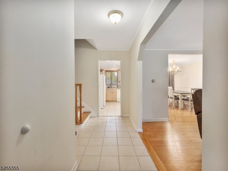69 Intervale Road Boonton, NJ 07005 - Photo 4 of 29 wooden floor with a view of bathroom