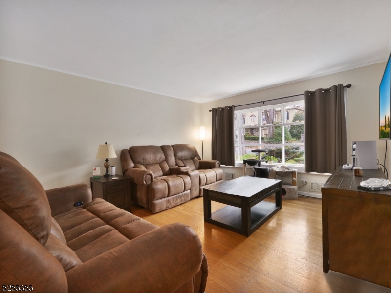 69 Intervale Road Boonton, NJ 07005 - Photo 6 of 29 a living room with furniture and a large window