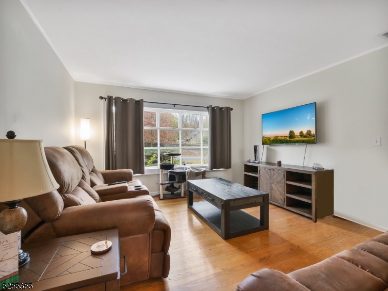 69 Intervale Road Boonton, NJ 07005 - Photo 7 of 29 a living room with furniture and a flat screen tv