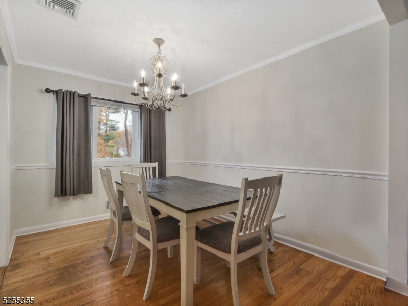 69 Intervale Road Boonton, NJ 07005 - Photo 9 of 29 a view of a dining room with furniture and window