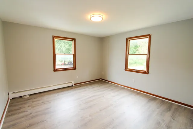 an empty room with windows