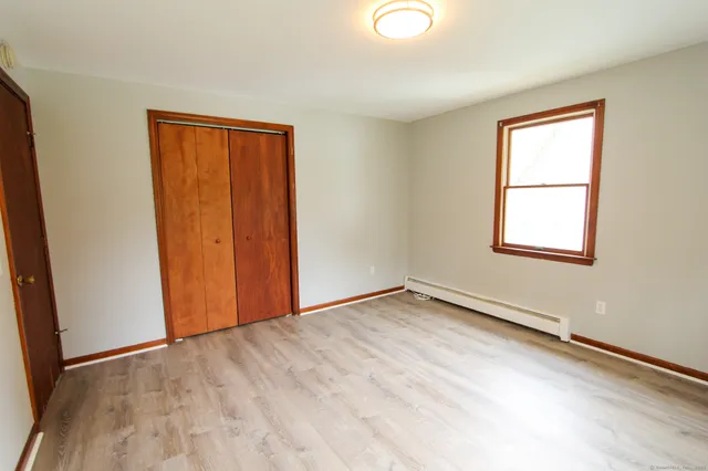 a view of an empty room and window
