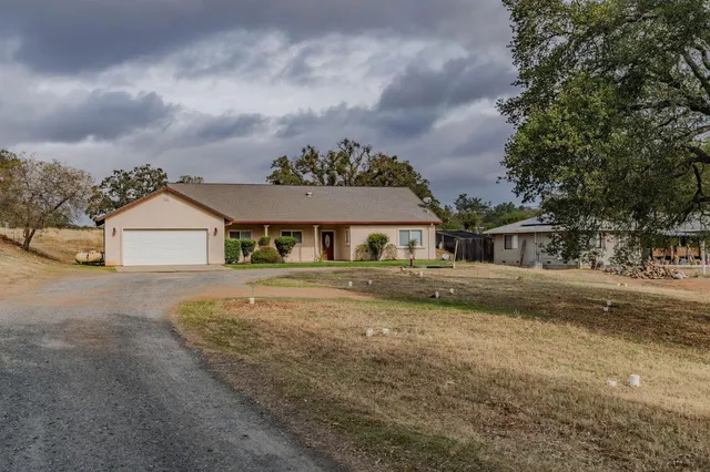 a picture of a bathroom with a shower