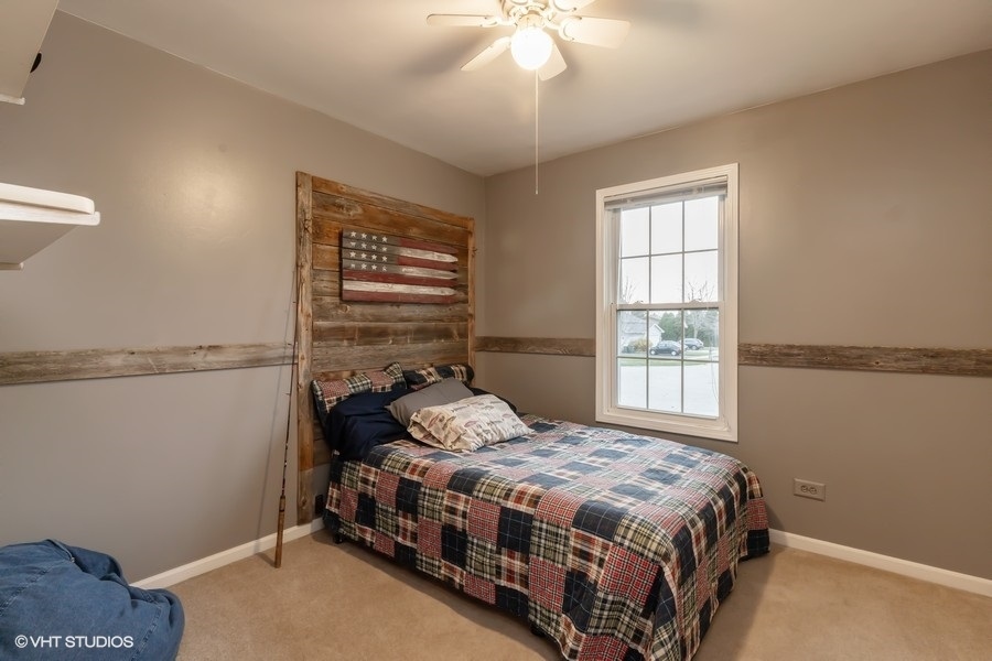 136 Tree Line Antioch, IL 60002 - Photo 11 of 17 a bedroom with a bed and window