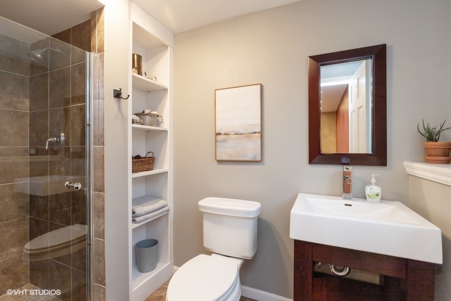 136 Tree Line Antioch, IL 60002 - Photo 12 of 17 a bathroom with a toilet sink and shower
