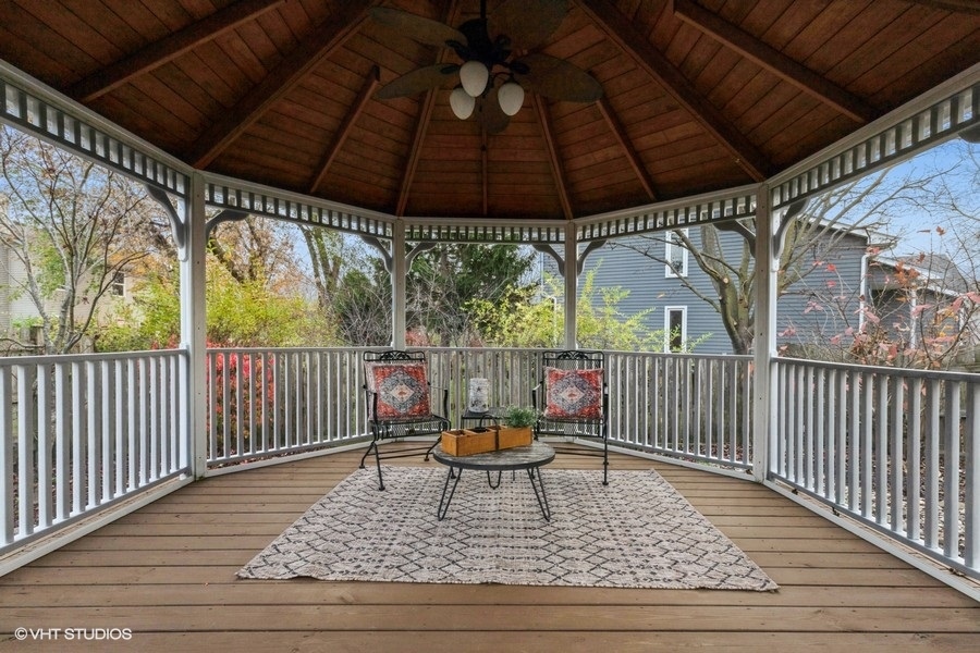 136 Tree Line Antioch, IL 60002 - Photo 14 of 17 a roof deck with table and chairs