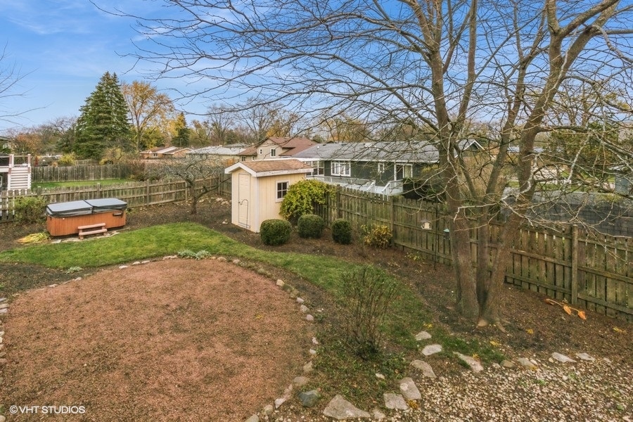 136 Tree Line Antioch, IL 60002 - Photo 17 of 17 a backyard of a house with lots of green space
