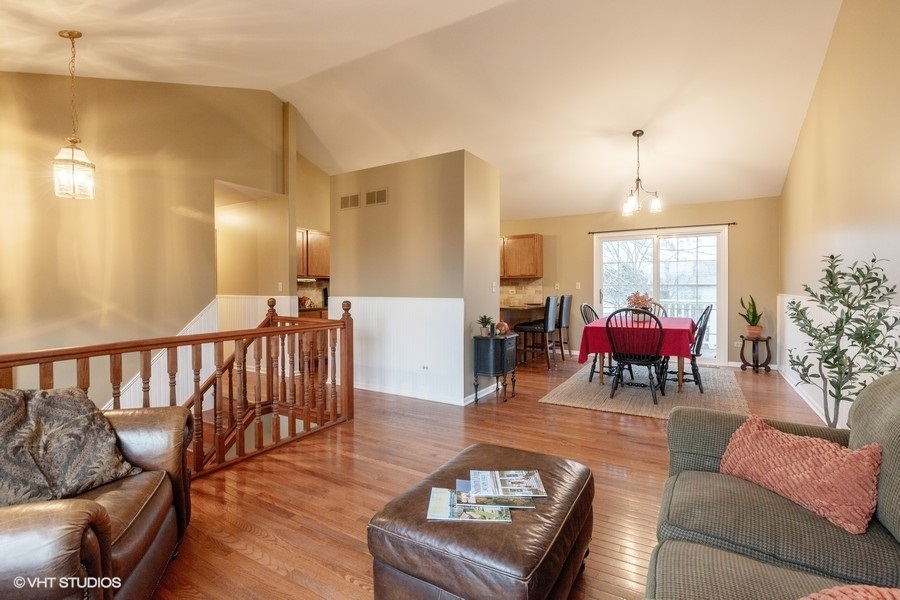 136 Tree Line Antioch, IL 60002 - Photo 2 of 17 a living room with furniture and a large window