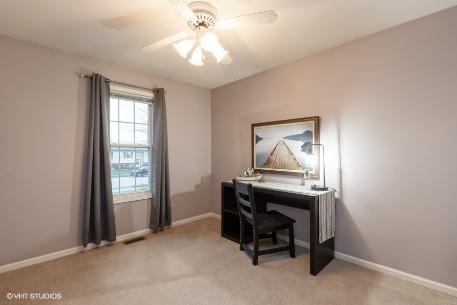 136 Tree Line Antioch, IL 60002 - Photo 10 of 17 a view of workspace with a window and furniture