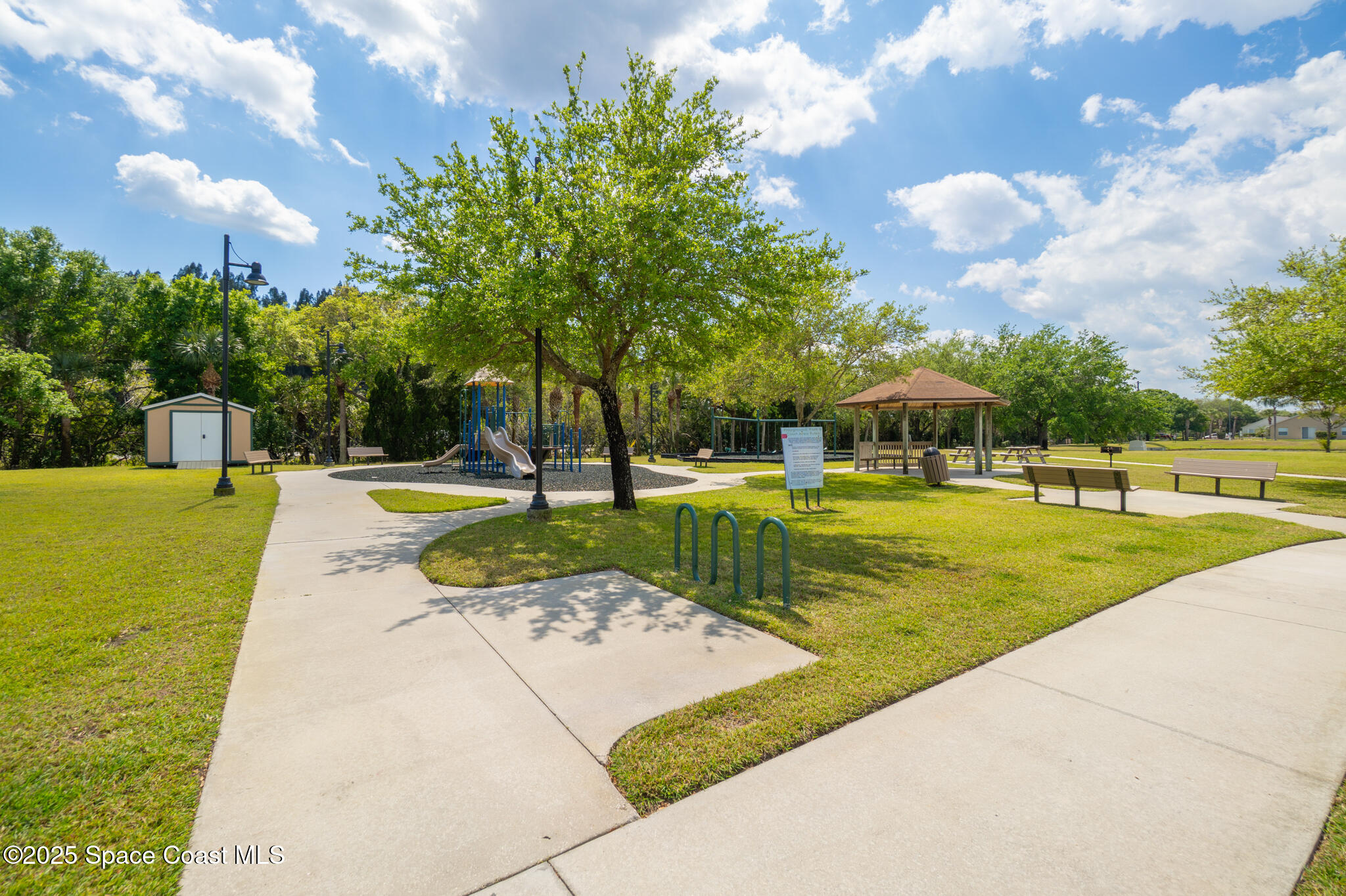 285 Dryden Circle Cocoa, FL 32926 - Photo 39 of 61 a view of swimming pool with garden