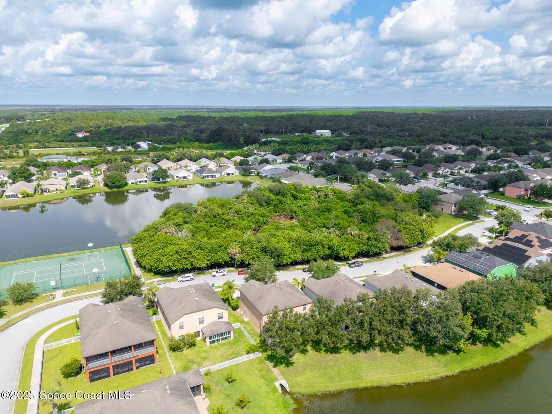 285 Dryden Circle Cocoa, FL 32926 - Photo 48 of 61 an aerial view of residential houses with outdoor space
