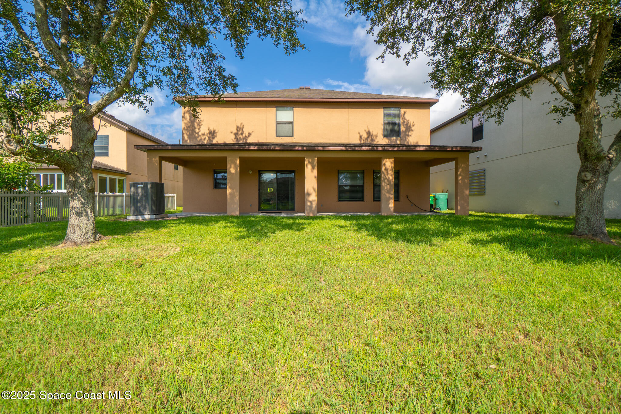 285 Dryden Circle Cocoa, FL 32926 - Photo 57 of 61 a view of a house with a big yard and large tree