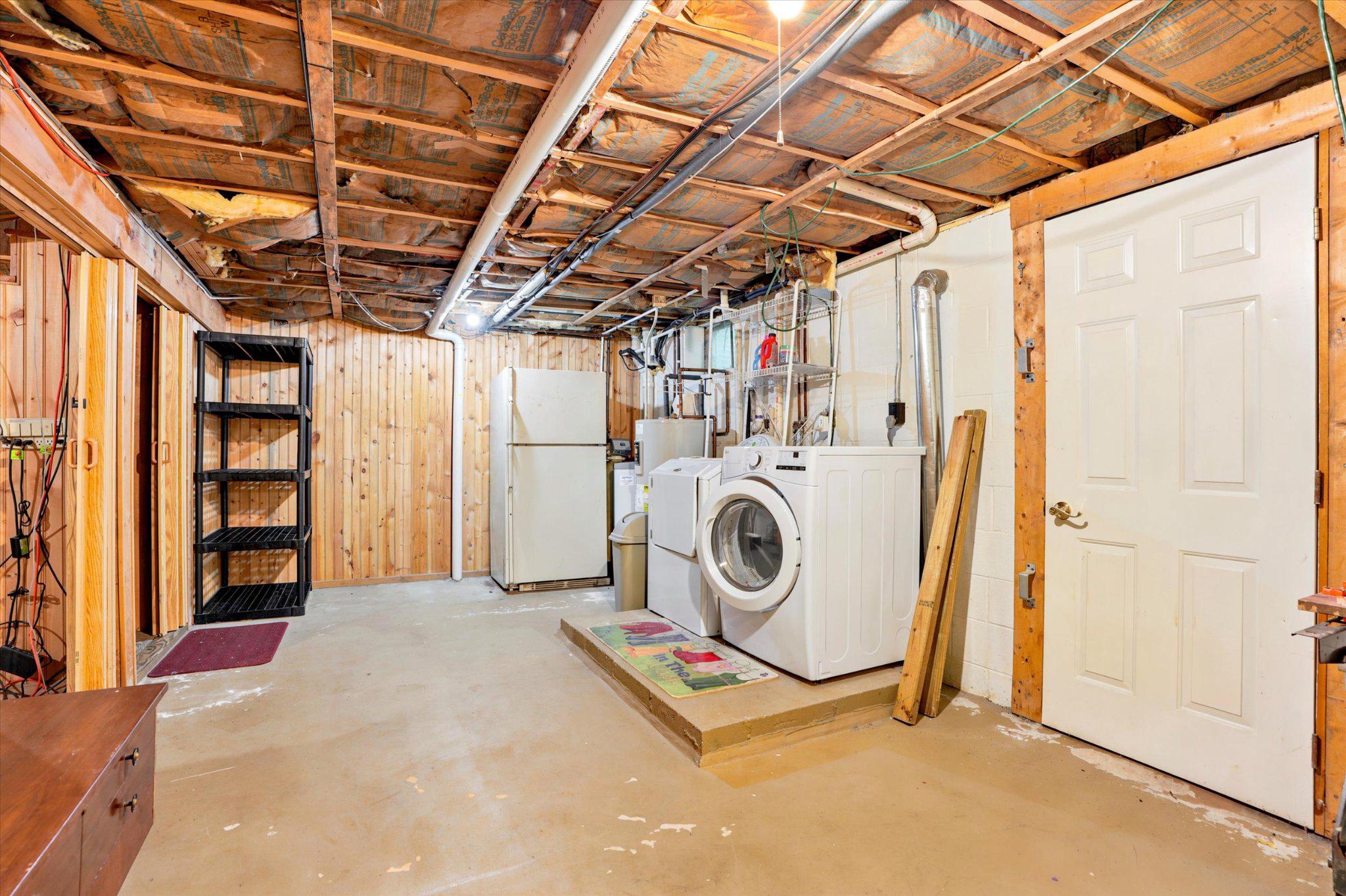 607 Kulp Road Perkiomenville, PA 18074 - Photo 26 of 39 Spacious basement with laundry setup.