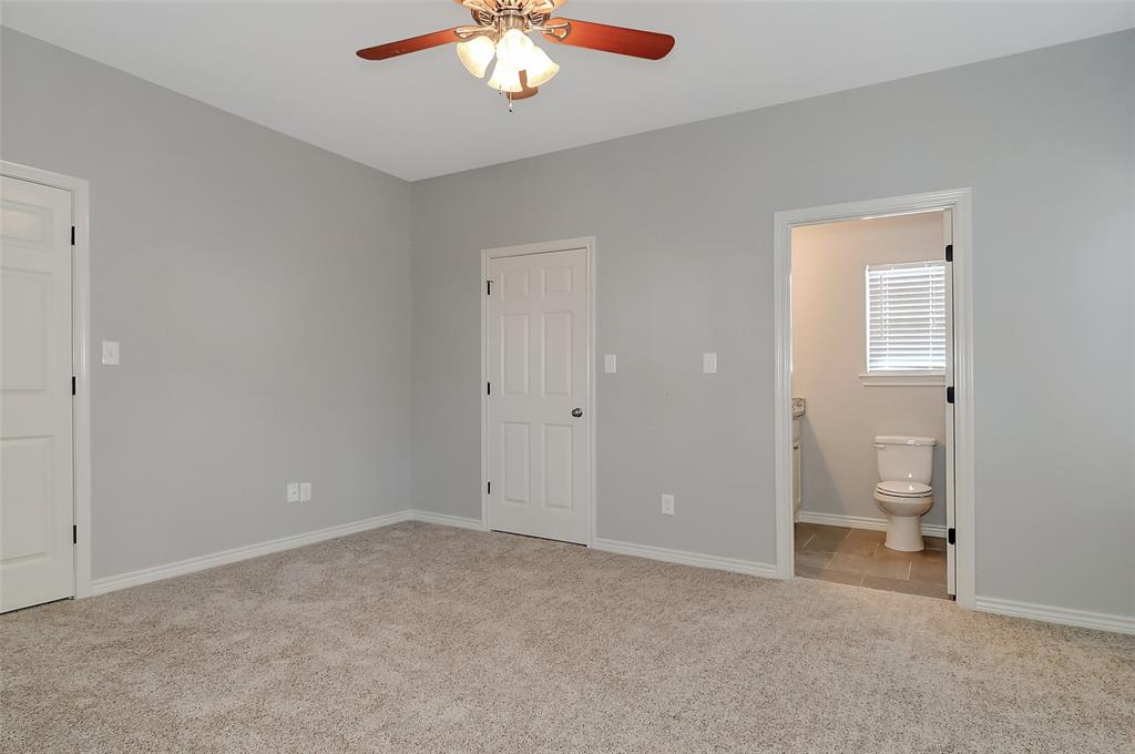 613 East Rosedale Street Sherman, TX 75090 - Photo 11 of 21 a view of an empty room with a chandelier