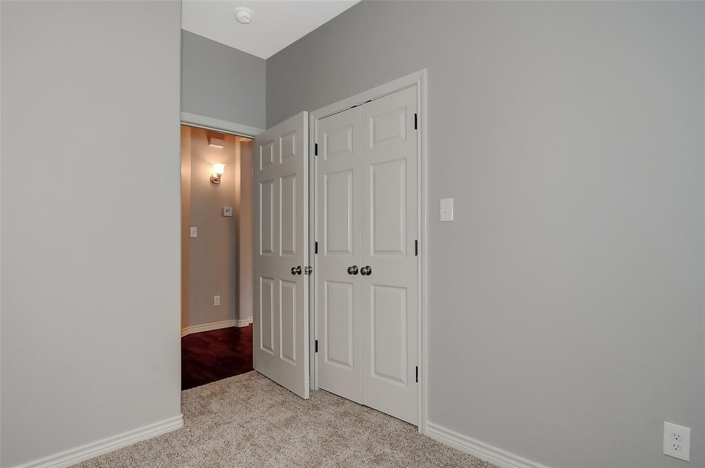 613 East Rosedale Street Sherman, TX 75090 - Photo 20 of 21 a view of an empty room with closet and mirror